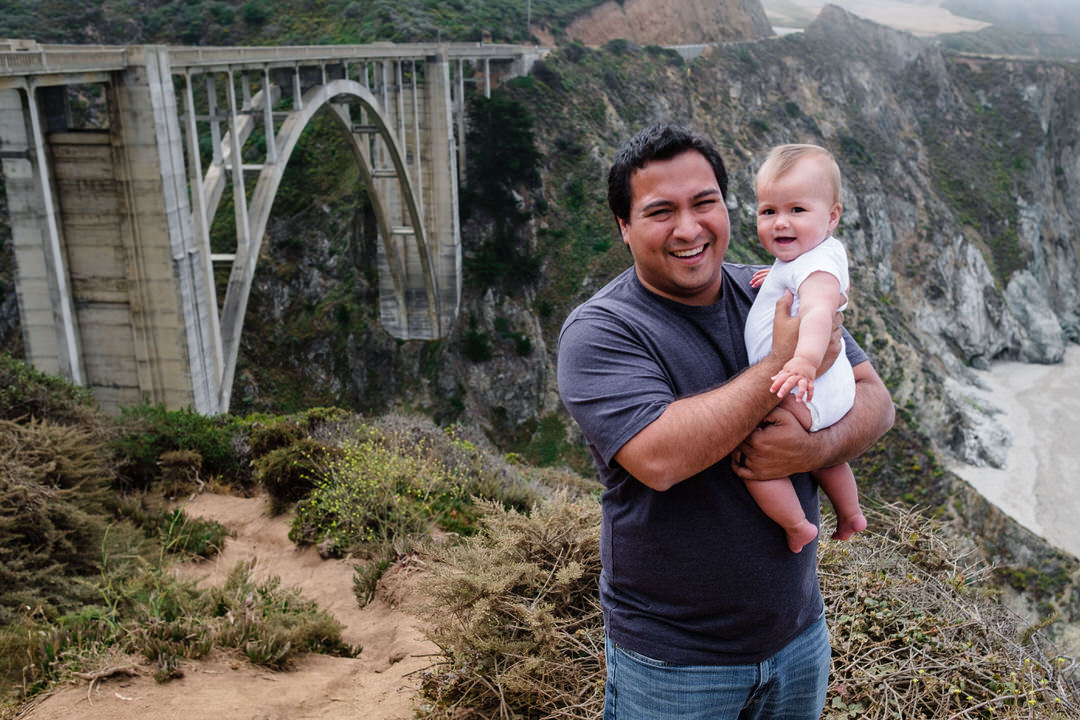dad and baby enjoy Bixby bridge