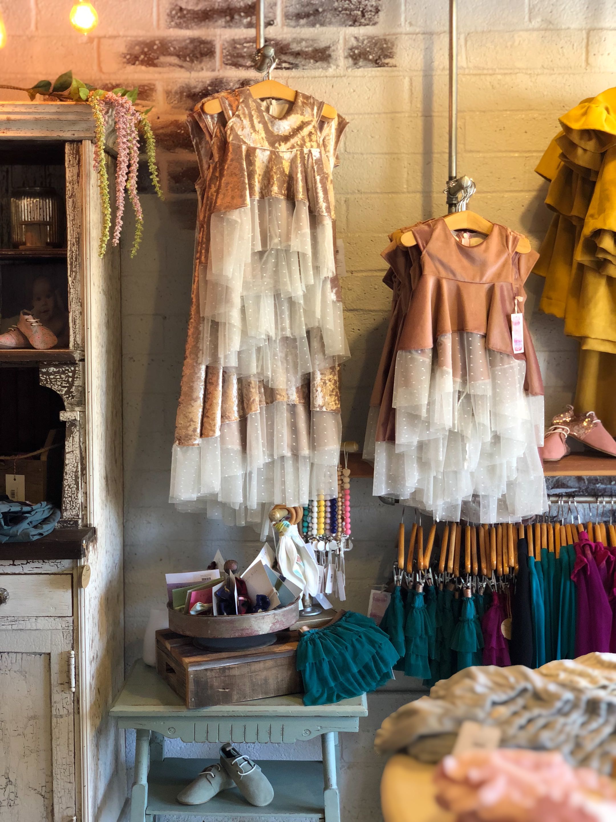 dresses hanging in cavelle kids in old town clovis